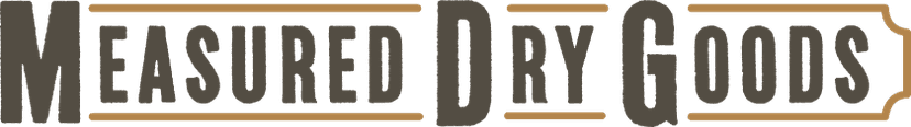 Measured Dry Goods - Logo